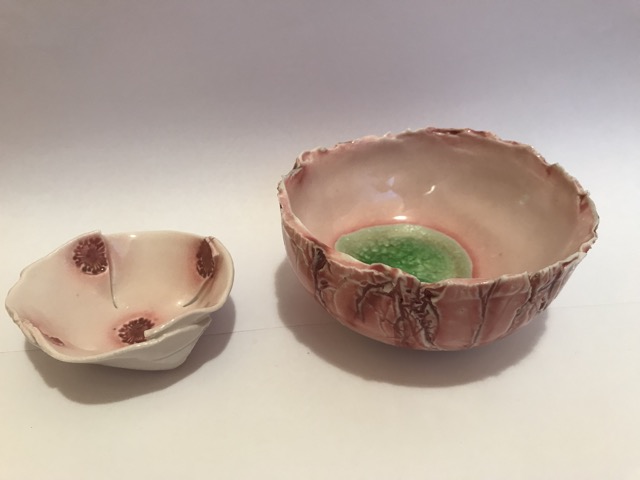 Two pink vessels